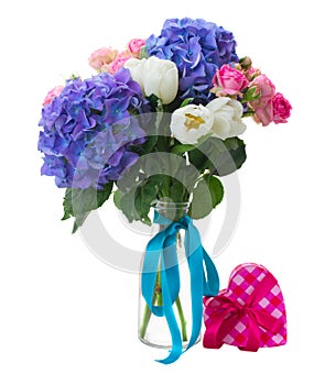 Posy of white tulips, pink roses and blue hortensia flowers
