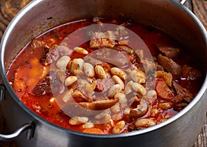 Pot with beans and pork stew