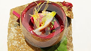 A pot from beetroot and herring. Snack