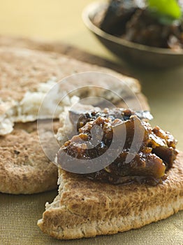 Pot of Brinjal Chutney with Naan Bread