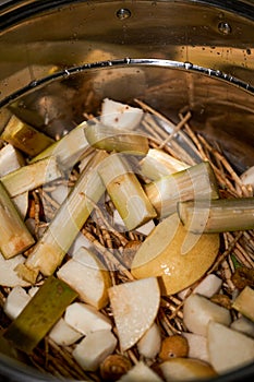 A pot of Cantonese traditional herbal tea, choke root sugar cane water