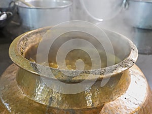 Pot of dahl cooking at gurudwara bangla sahib sikh temple in delhi