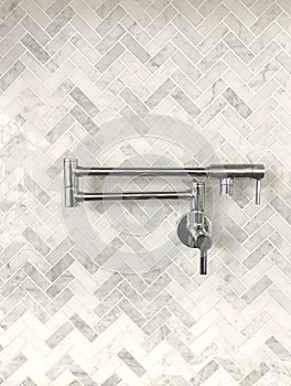 Pot filler marble herringbone backsplash modern kitchen