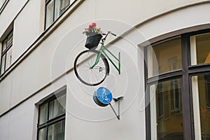 Pot with flowers in form of bicycle. Bicycle with flowers creative design city urbanism