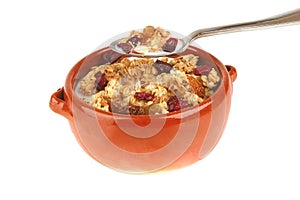 Pot full of granola with nuts