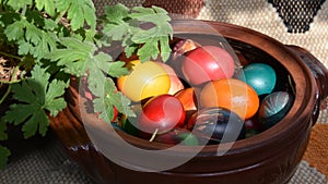 Pot full of multicolored Easter eggs