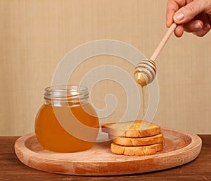 Pot of honey and rusks