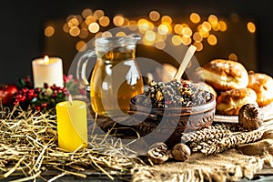 Pot with kutia traditional meal in eve Christmas. sweet meal on bright background. place for text