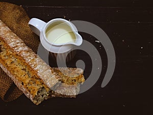 Pot with milk and bread