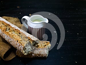 Pot with milk and bread