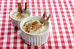 Pot with rice pudding - sprinkled with cinnamon