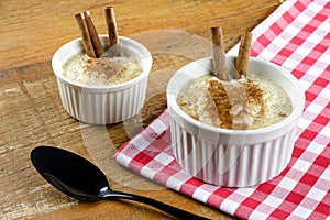 Pot with rice pudding - sprinkled with cinnamon
