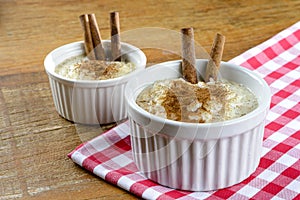 Pot with rice pudding - sprinkled with cinnamon