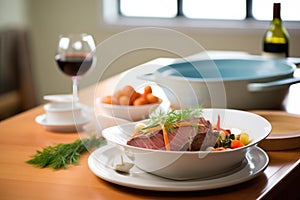 pot roast set for dining with wine and dinnerware