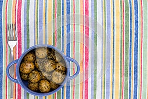 Pot of savory seasoned baby potatoes