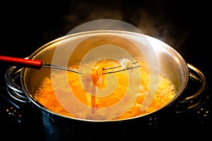 A pot on the stove cooking rice