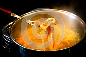 A pot on the stove cooking rice