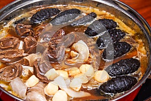 A pot of sumptuous and luxurious Chinese New Year Poon Choi, delicacies from both mountains and seas