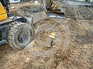 Potable water pipes rebuilding. Old excavator excavation work