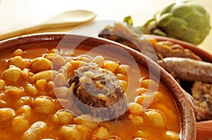 Potaje de judias y garbanzos, a traditional spanish legume stew photo