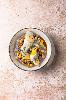 Potaje de vigilia - Chickpea stew with spinach and cod. Typical spanish food for Easter holidays. Chickpea stew with spinach