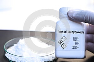 Potassium hydroxide in bottle , chemical in the laboratory and industry