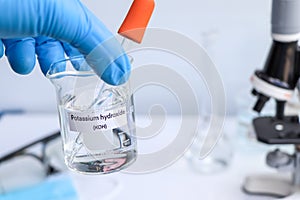 potassium hydroxide in glass, chemical in the laboratory and industry