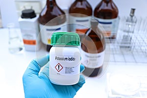 Potassium iodide in chemical container , chemical in the laboratory and industry
