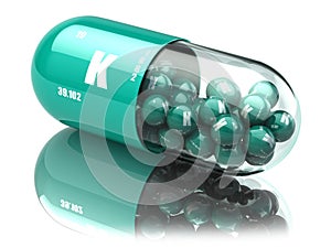Potassium K element pill. Dietary supplements. Vitamin capsules. photo