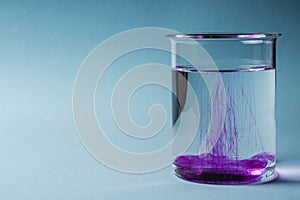 potassium permanganate solution on a blue background