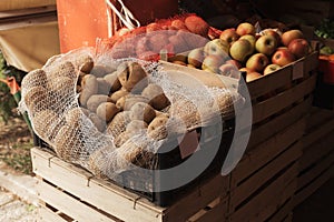 Potato and apples grown locally on outdoor farmer`s market