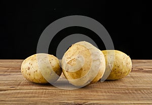 Potato on a black background