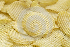 Potato chips background close up