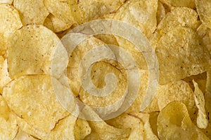 Potato chips background close-up