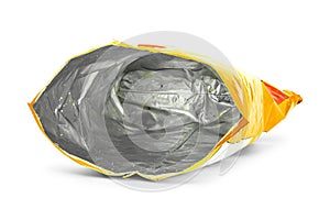 Potato chips bag isolated on white background. Inside of leftovers snack packaging