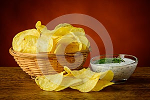 Potato chips and dill dip photo