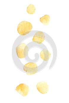 Potato chips falling isolated on white background