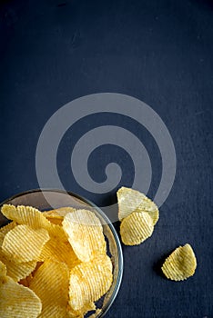 Potato chips in the glass bowl