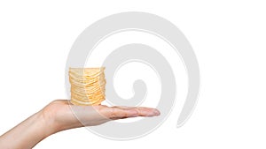 Potato chips in hand isolated on white background. copy space, template