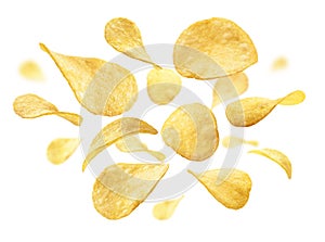 Potato chips levitate on a white background