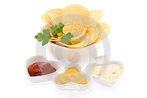 Potato chips with parsley and sauces