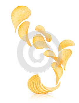 Potato chips rise up from the pile with chips on a white