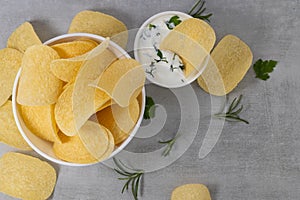 Potato chips and sauce with spices top view with