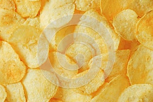 Potato chips snack as background image texture background. Top view. Copy, empty space for text