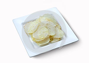 Potato chips and soft drink in glass on white background, Selecti