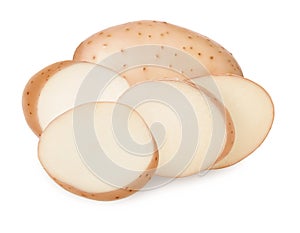  potato. Cut spud slices of fresh raw potatoes with skin and a whole tuber  on a white background, vegetables crop
