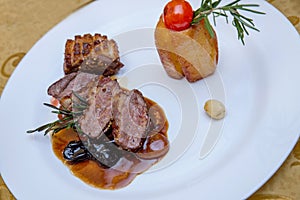 Potato with duck breast in candied fruits souce