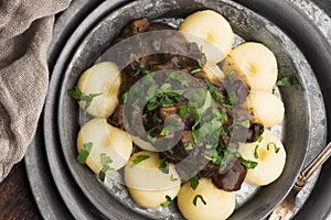 Potato dumplings and forest mushroom sauce