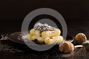 Potato dumplings with poppy seeds and sugar