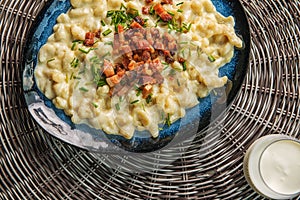 Potato dumplings with sheep cheese and bacon, traditional slovakian food, slovak gastronomy